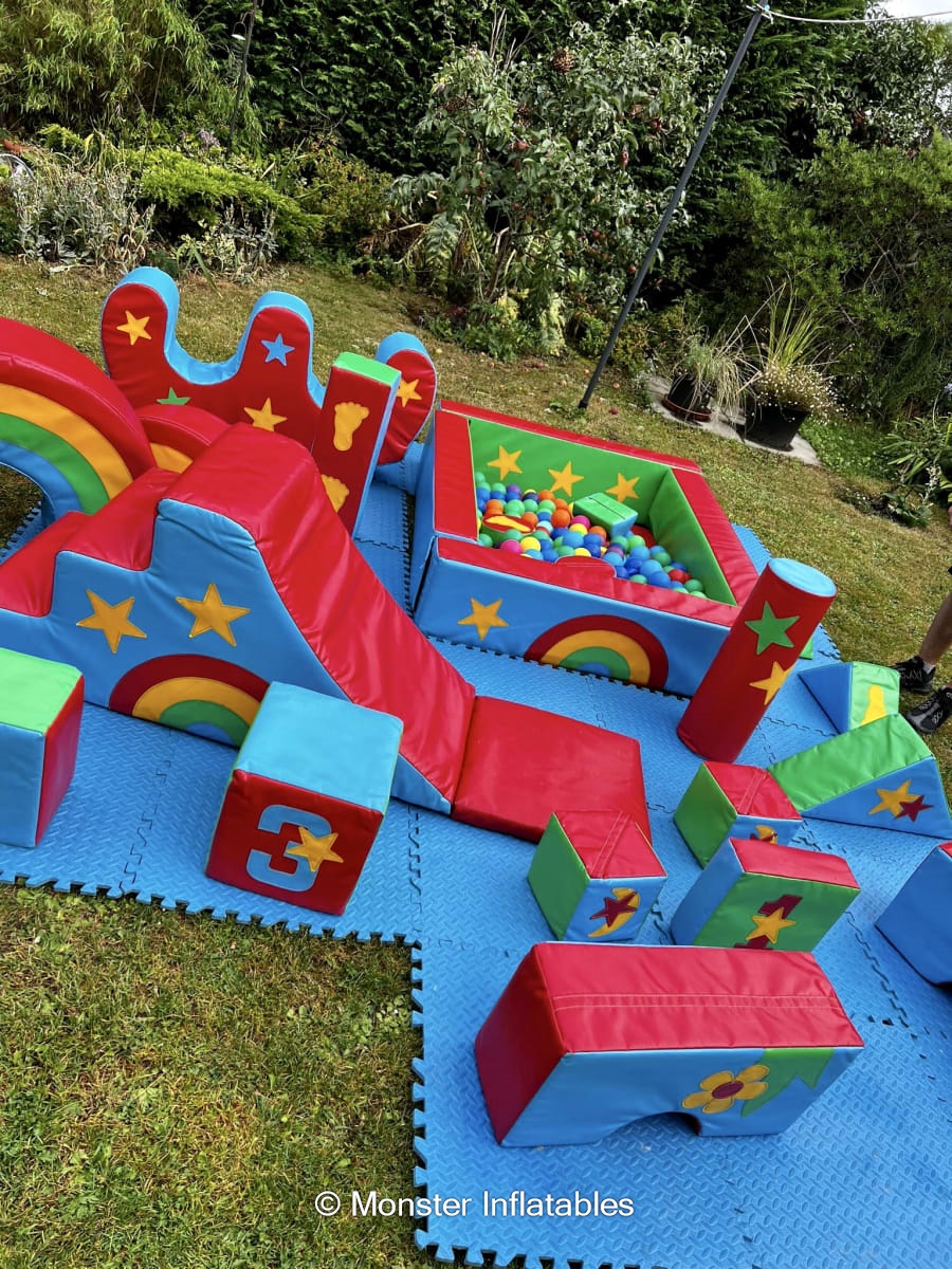 Rainbow Soft Play Deluxe Bouncy Castle Soft Play Hire in