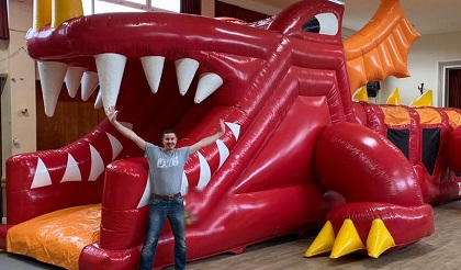 Showing off our dragon inflatable assault course in Braintree Inflatable Assault Course and Bouncy Castle Hire Braintree